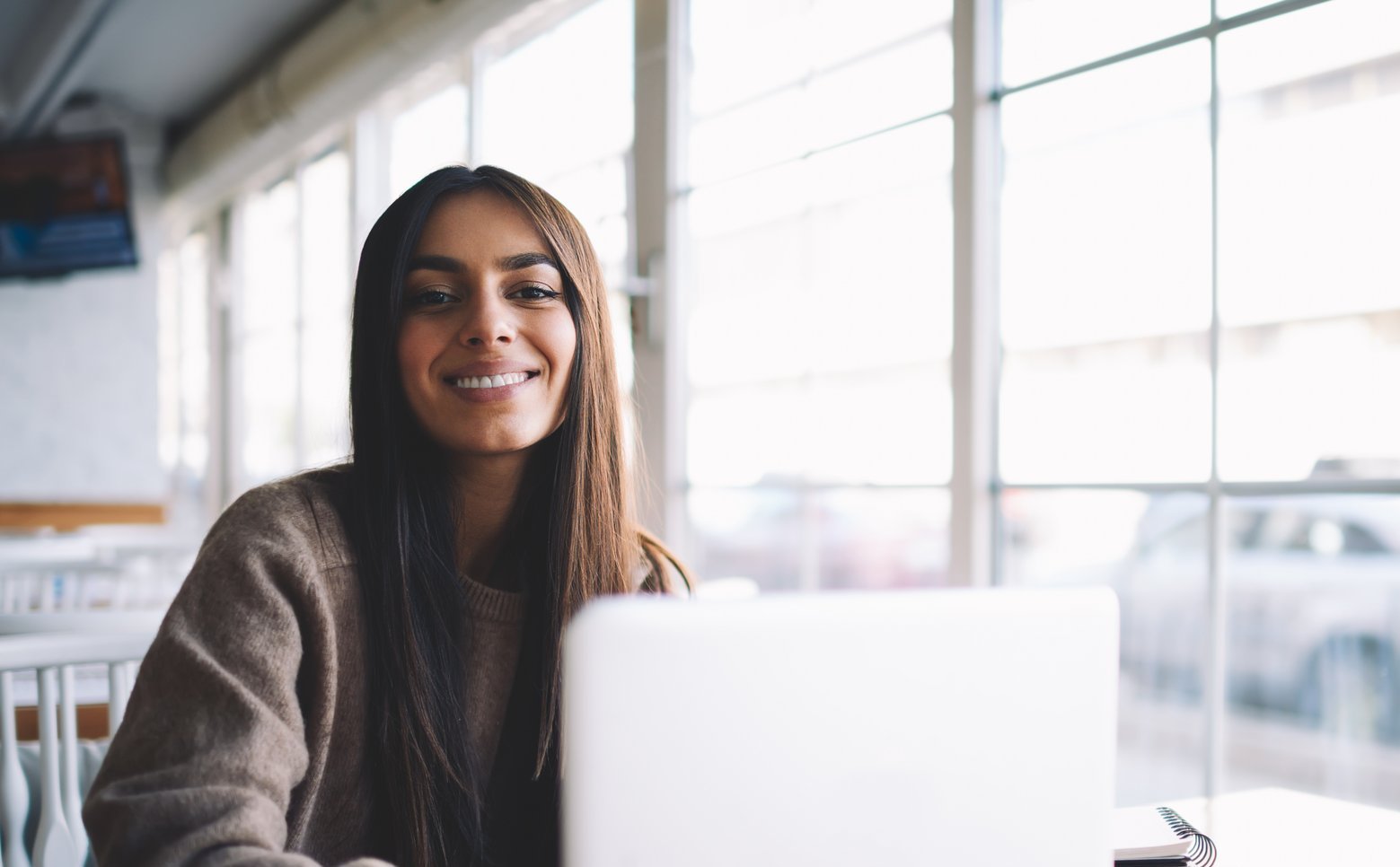 A person in front of a laptop